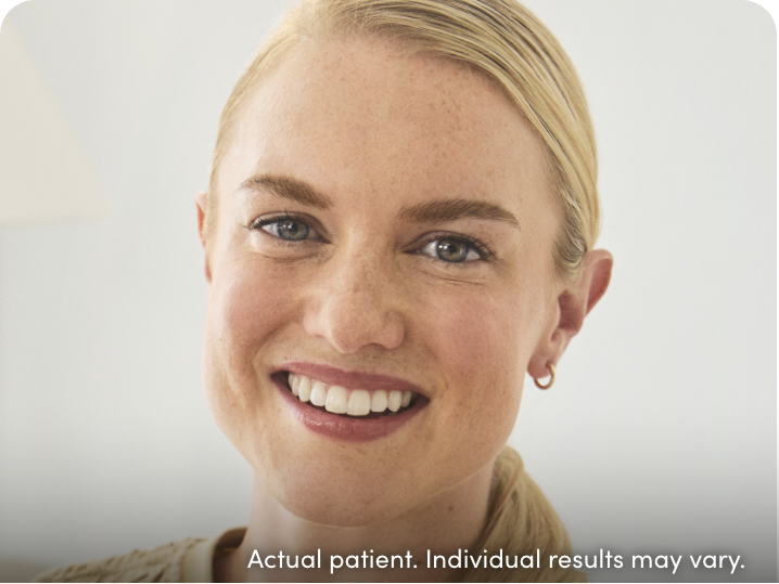Smiling blonde woman with text 'Actual patient. Individual results may vary'
