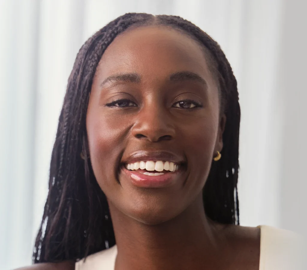 Smiling patient with microbraids